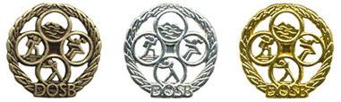 Drei Medaillen des Deutschen Olympischen Sportbundes in Bronze, Silber und Gold, umgeben von einem Lorbeerkranz.